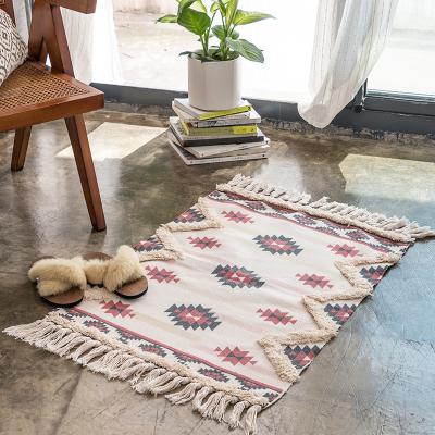 China Stain Resistant Nordic Design Hand Tying Tassels Adorned Printed Door Floor Mat For Decoration for sale