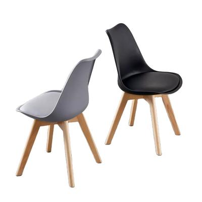 China Space Saving Dining Chair Plastic Wood Lounge Chair With Wooden Legs Chair Living Room Furniture for sale