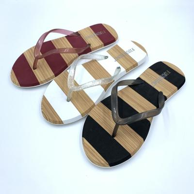 China Woodgrain Printed Matching EVA Outsole Ladies Flip-Flops for sale