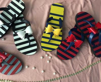 China Deodorization Bowknot Stripe Printed Flip Flop Splint Slippers Rubber Beach Shoes For Women for sale