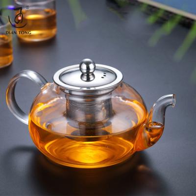 China DianTong Viable Heat Resistant Clear Pyrex Borosilicate Glass Teapot Clear Teapot with Stainless Steel Infuser and Glass Warmer for sale