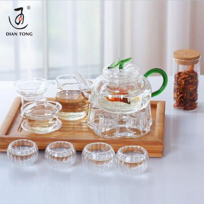 China DianTong Pyrex 800ml High Sustainable Clear Heat Resistant Transparent Borosilicate Tea Glass Pot Teapot With Infuser And Warmer for sale