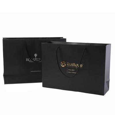 China New Gold Logo Hot Foiled Stamping Black Matt Paper Bag Recyclable Shopping Bag for sale