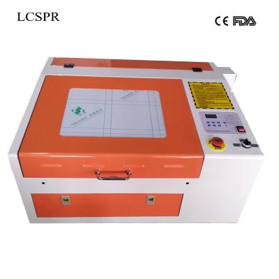 China Laser Engraving Free Shipping Hot Sale 4040 50W Laser Engraving And Cutting Machine Model With Good Price for sale