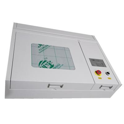 China Laser Engraving SP-4040 CO2 Laser+Printers Stamp Machine with Good Price and Higher Quality for sale