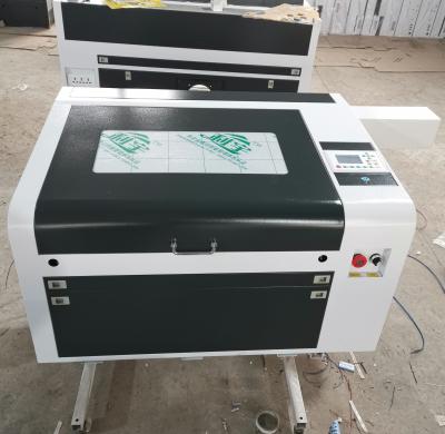 China laser engraver ruida 4060 100w 6040 laser cutting machine 6040 engraving machine cutting fabric leather wool-acrylic plexiglass for sale