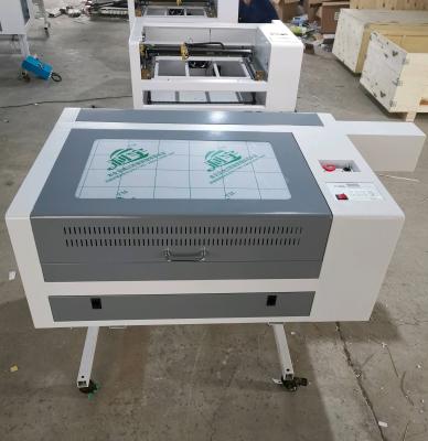 China Laser Engraving 4060 m2 EFR 60w Laser Engraving and Acrylic Rubber MDF Wood Cutting Machine Dwg for sale