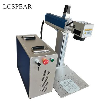 China Air-cooled 50w JPT auto focus fiber laser marking machine with D80 rotary tools have good price for sale