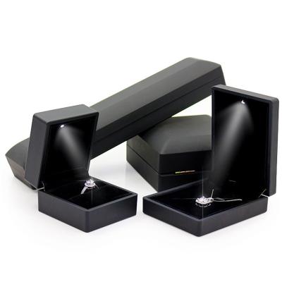 China Rubber+Baking Paint 2022 New Jewelry Packaging Box Led Light Large Jewelry Set Box Jewelry Box Led Light for sale