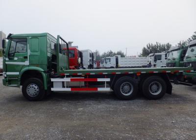 Chine Camion à conteneurs HOWO à plateau de type 6x4 à entraînement 20 pieds à verrouillage à torsion à vendre