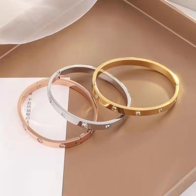 China TRENDY Classic Design 18K Oval Women's Gold Bangle Zircon Fashion Stainless Steel Bracelet for sale