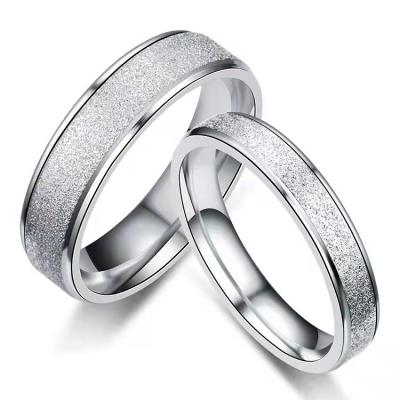 China New Fashion Stainless Steel Ground Sandy Ring Is Romantic And Contracted Lovers Pair Ring Sandy Hand I for sale