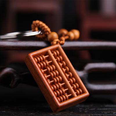 China Eco-friendly Fishing Key Chain Abacus Car Key Chain Nafu Wholesale Wood Pendant Gift for sale