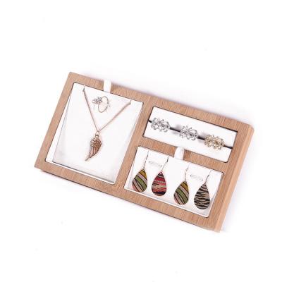 China Jewelry Disply Necklace Ring Jewelry Display Tray Bamboo Wooden Jewelry Display Set White Leather Jewelry Display for sale