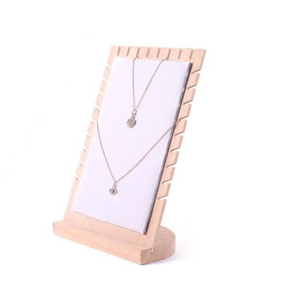 China Jewelry Disply Groove Chain Dish Necklace Jewelry Stand Jewelry Display Rack Jewelry Store Counter Window Display Wooden Three Props for sale