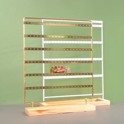 China Jewelry Display Metal With Wooden Base 5 Tier 100 Holes Jewelry Store Rack Show Furniture Earring Display Stand Organizer Jewelry Rack for sale