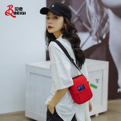 China Special Polyester+Peach Skin Men Women Simple Cool Design Fashion Woven Label Bq Style Mini Small Crossbody Single Shoulder Casual Messenger Bag for sale