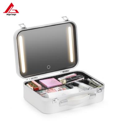 China 2023 New Fashion Makeup Case With Large Capacity Mirror Lightweight Adjustable Led Portable Professional Storage Box For Makeup Artist for sale