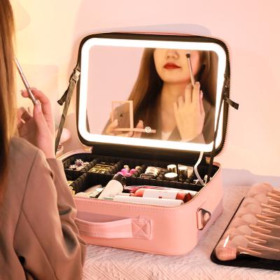 China Fashion Fashion Custom Printed Cosmetic Waterproof Makeup Brush Bag With LED Light Mirror for sale