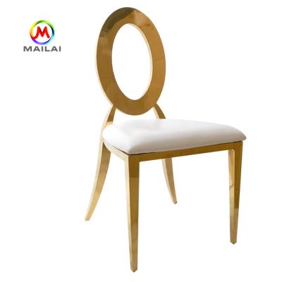 China Banquet Wedding Modern Wholesale Stacking Stainless Steel Leather Round Back Dining Chair Gold Silver for sale