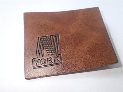 China Custom Leather Label Design Clothing Embossed Leather Patches For Garment for sale