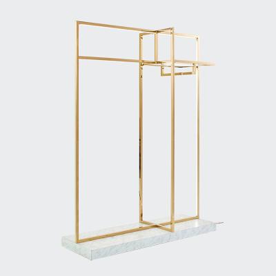 China Luxury Garment Shop Interior Rack With Lights Gold Metal Dressing Rack Furniture Furniture Cabinet Display Matte Glossy Design Shelf for sale