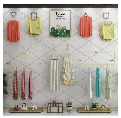 China For Garment Shop Fashion Design Custom Size Clothing Wall Mounted Garment Display Racks for sale