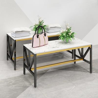 China For Store Modern Design Rectangle Black Gold Color Stainless Steel Shop Display Table Rack For Bags Shoes for sale