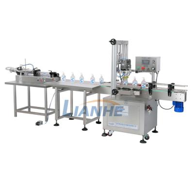 China Small beverage liquid filling machine, capping and filling labeling machine, semi automatic filler for liquid for sale