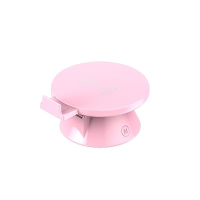 China Multi Round Desktop Clock Phone Holder Pink Loudspeaker Car Wireless Charger Phone for sale