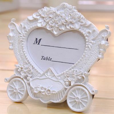 China Resin Ywbeyond Unique Wedding Decorations Souvenirs For Wedding Guests White Pumpkin Carriage Image Photo Frame for sale