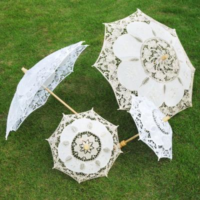 China Ivory white cotton embroidery bride lace parasol umbrella photo studio props wedding umbrella decorations for sale