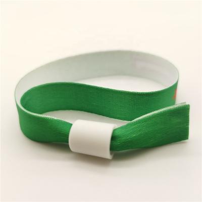 China Europe Tie Sublimation Satin Clip Ribbon Fabric Promotional Textile Woven Wristbands For Music Festival Events for sale