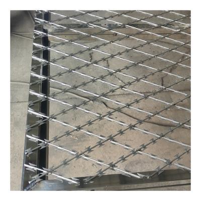 China Protective construction Lowes Prices Prison Mesh Fence Hot Dipped Galvanized Roll Concertina Double Strand Razor Blade Barbed Wire for sale