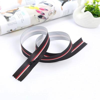 China 5# Different Types High End Waterproof Fashionable Waterproof PU Plastic Zipper For Clothes Garment for sale