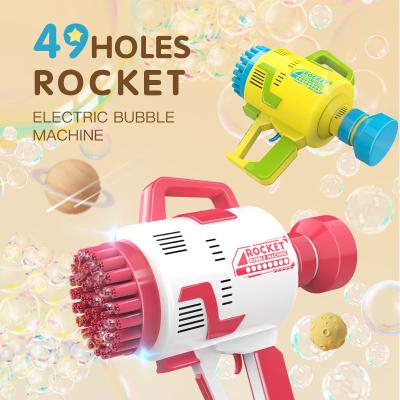 China Plastic Bubble Rocket Boom Bubble Machine with 49-Hole for Kids Rocket Bubble Maker Blower, Automatic Bubble Toys, 5000+ Bubbles Per Minute for sale