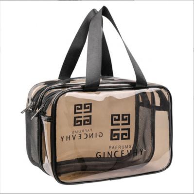 China Portable and Large Capacity PVC Cosmetic Bags Waterproof Double Layer Transparent Bag Makeup and Traveling Cosmetic Bag for sale