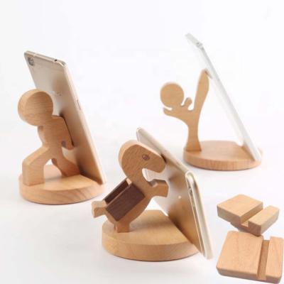 China Compatiable with creative wood ipad cell phone stands represent cell phones ipads for sale