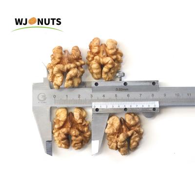 China Wangjiang Supplier 100% Dry Natural Coated Light Walnut Halves Kernel for sale