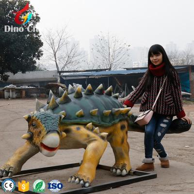 China Waterproof Resin Garden Decoration Raptor Dinosaur Life Size Statue For Sale for sale