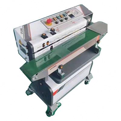 China Automatic Linear Plastic Snack Food Sealing Tray Sealing Machine With Nitrogen Sealing Machine for sale