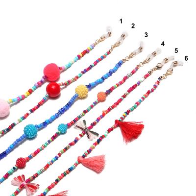 China Glasses chain hot sale handmade beaded mask chain women sunglasses chain chic colorful seed bead bow tassel glass monocle lanyard for sale