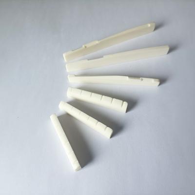 China Fashionable Guitar Bone Nut And Saddle Natural Source Bone Nut And Saddle Manufacturer for sale