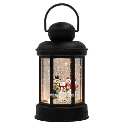 China European Christmas Festival Home Decoration Glitter Water Lantern Luminoue Snowman Family Christmas Swirling Globe for Holiday Season Home Decor for sale