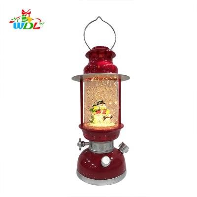 China Christamas Home Decoration/Red Plastic Lighted Rotating Water Globe Light Christmas Lantern Style Lamp Gift/Souvenir Kerosene Lamp for sale