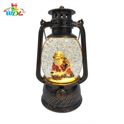 China Resin Home Craft Decoration Christamas Christmas Home Decor Accessories Battery Operated Water Globe Santa LED Christmas Snow Lantern for sale