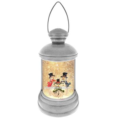 China Plastic+Liquid &USB Battery Powered Tie Down Swirl Water Powered Mini Christmas Lantern Snow Globe For Home Decor for sale