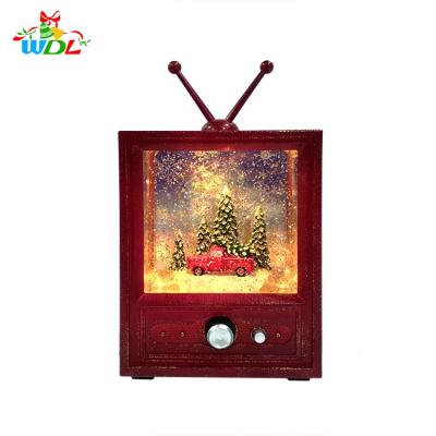 China Gift & Christmas Decoration Polyresin Indoor Table TV Set Christmas Decorative Antique Snowfall Led Lantern With Driving Car Christmas Tree Inside for sale