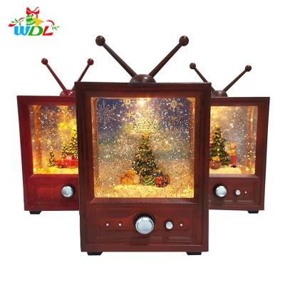 China Gift & 2020 Holiday Ornament Christmas Tree Craft Christmas Decoration New Arrivals Led Musical Shape TV Snow Globe Mini Snow Globes For Christmas Rotating Gift for sale