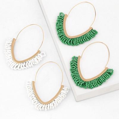 China FASHIONABLE Geometric Bohemian Handwoven Pearl Rice Style Alloy Circle V-Shaped Earrings For Women Jewelry for sale